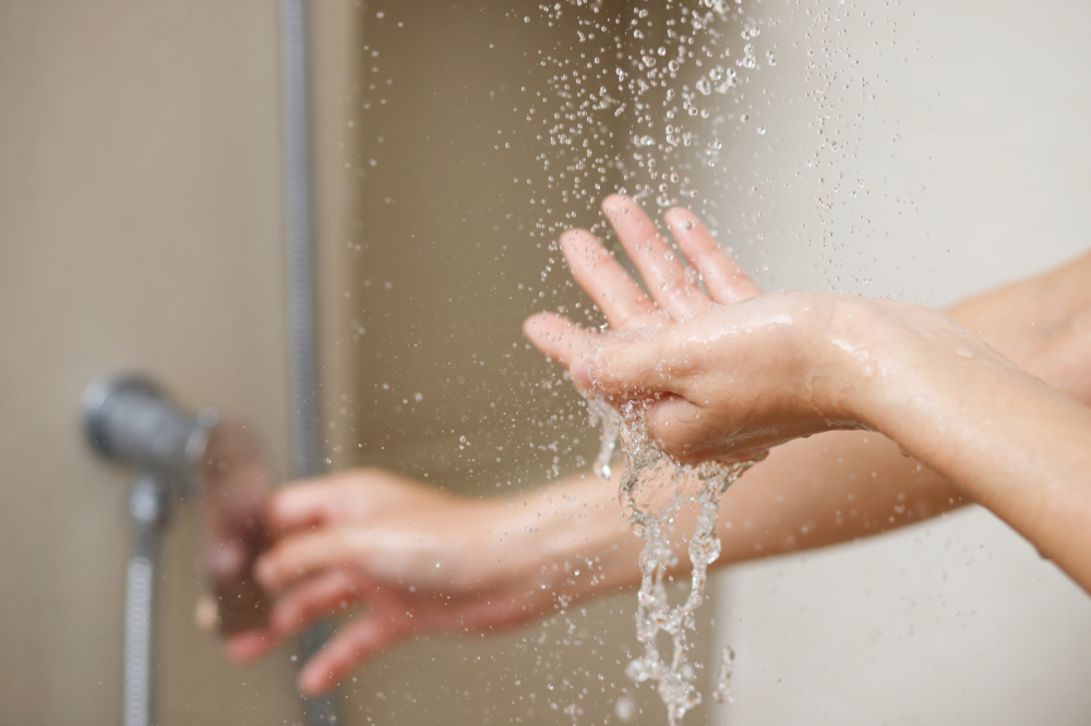 wet hands in shower